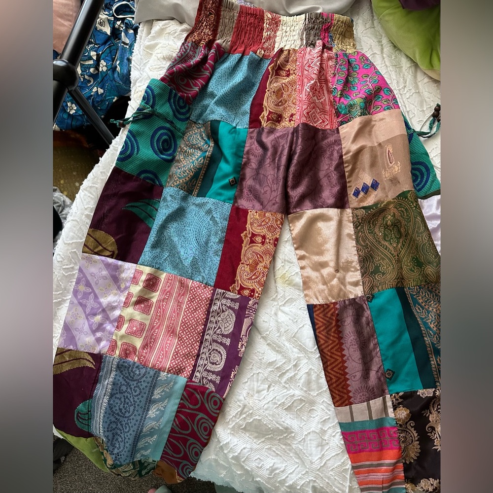 Boho hippie pants- tight at the waist than flow out- they do have pocket!